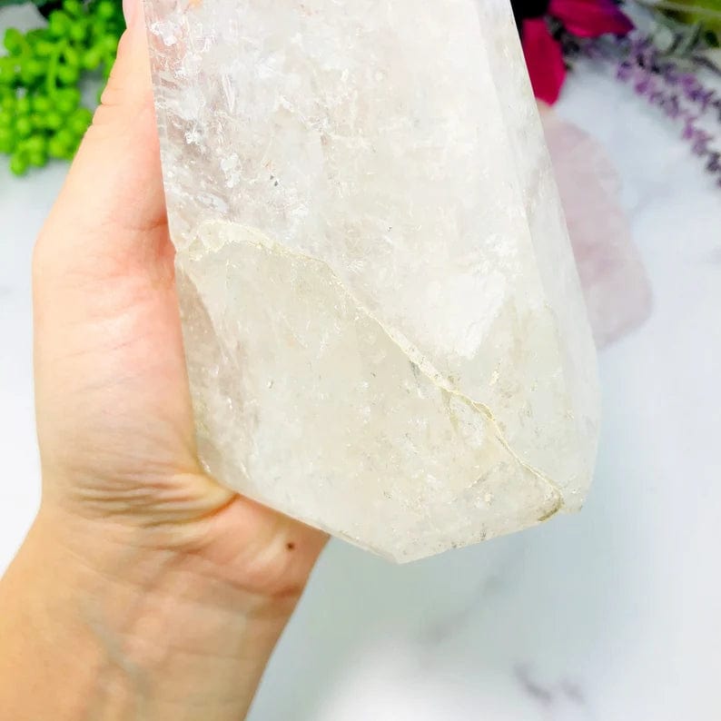 This picture is showing the continuation crack on this Crystal Quartz Polished Tower