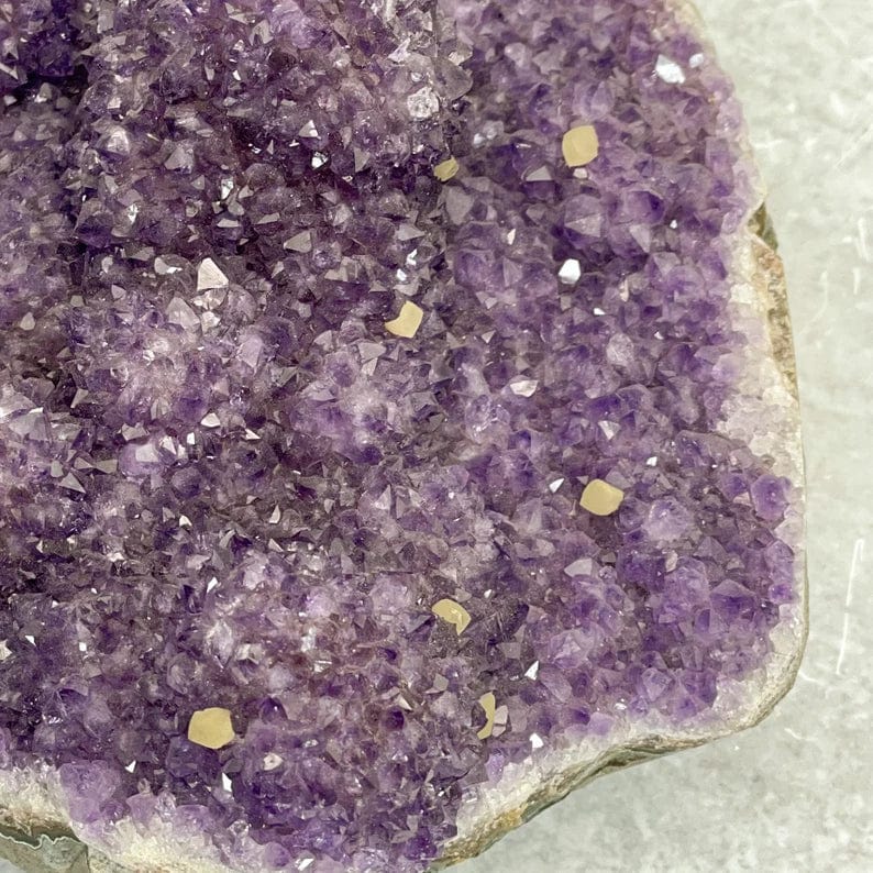 close up of purple amethyst cluster