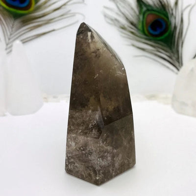 Smoky Quartz Polished Point side view on a white background