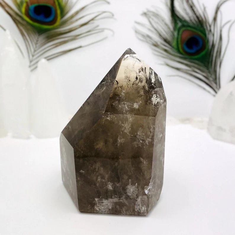 Smoky Quartz Polished Point front view on a white background