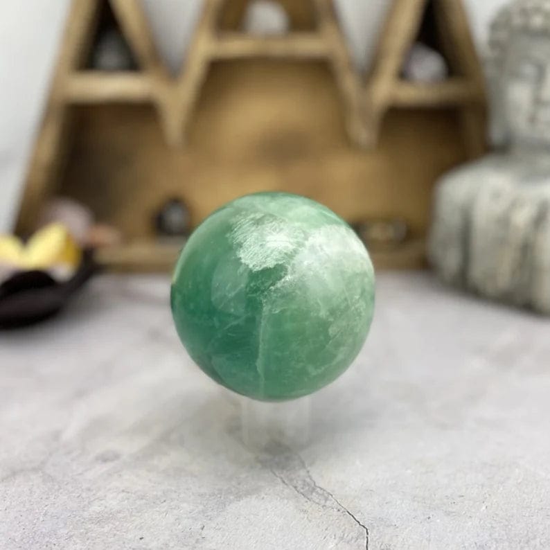 Green Fluorite Polished Sphere on clear stand (stand not included)