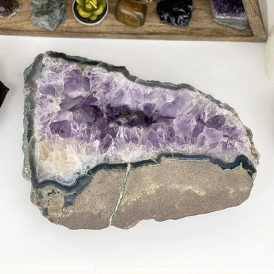 overhead view of the amethyst platter on white background.,