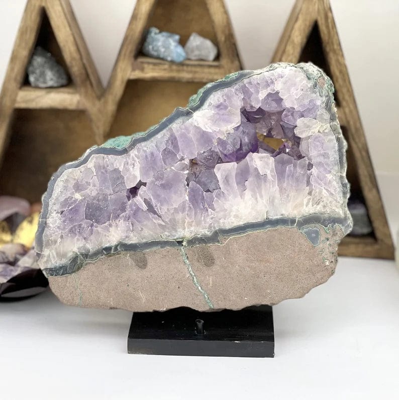 Amethyst platter displayed on a black stand which is not included.