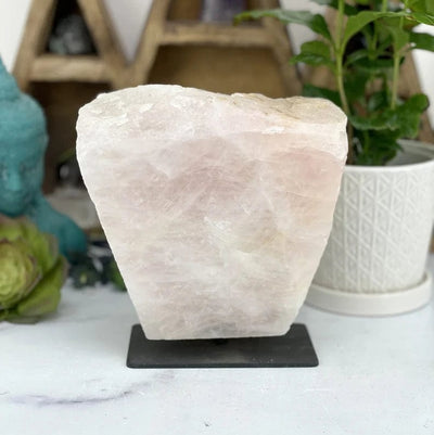 Rose Quartz on Metal Stand Polished size of the stone 