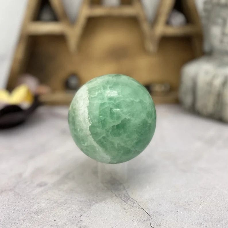Green Fluorite Polished Sphere in beautiful shades of green and white