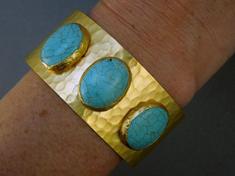 wrist wearing Triple Oval Turquoise Magnesite Slab 24k Gold Electroplated Cuff