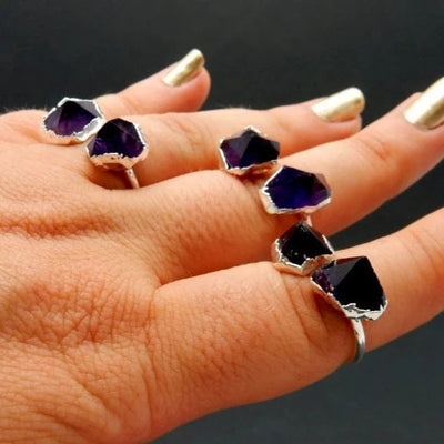 Double Amethyst Point Ring with Electroplated Silver Edges on an Adjustable Rings on fingers to show size reference