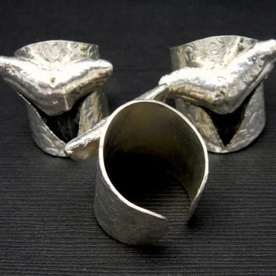 Black Shark Tooth Ring with Electroplated Silver Adjustable Hammered Bands shown from front and back sides