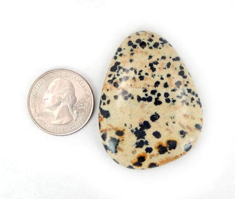 jasper bead next to quarter for size reference
