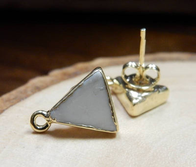 1 pair of white/gold Howlite Triangle Stud Earrings with Hoop baill. One flat on table showing back of earring. One laying on it's side