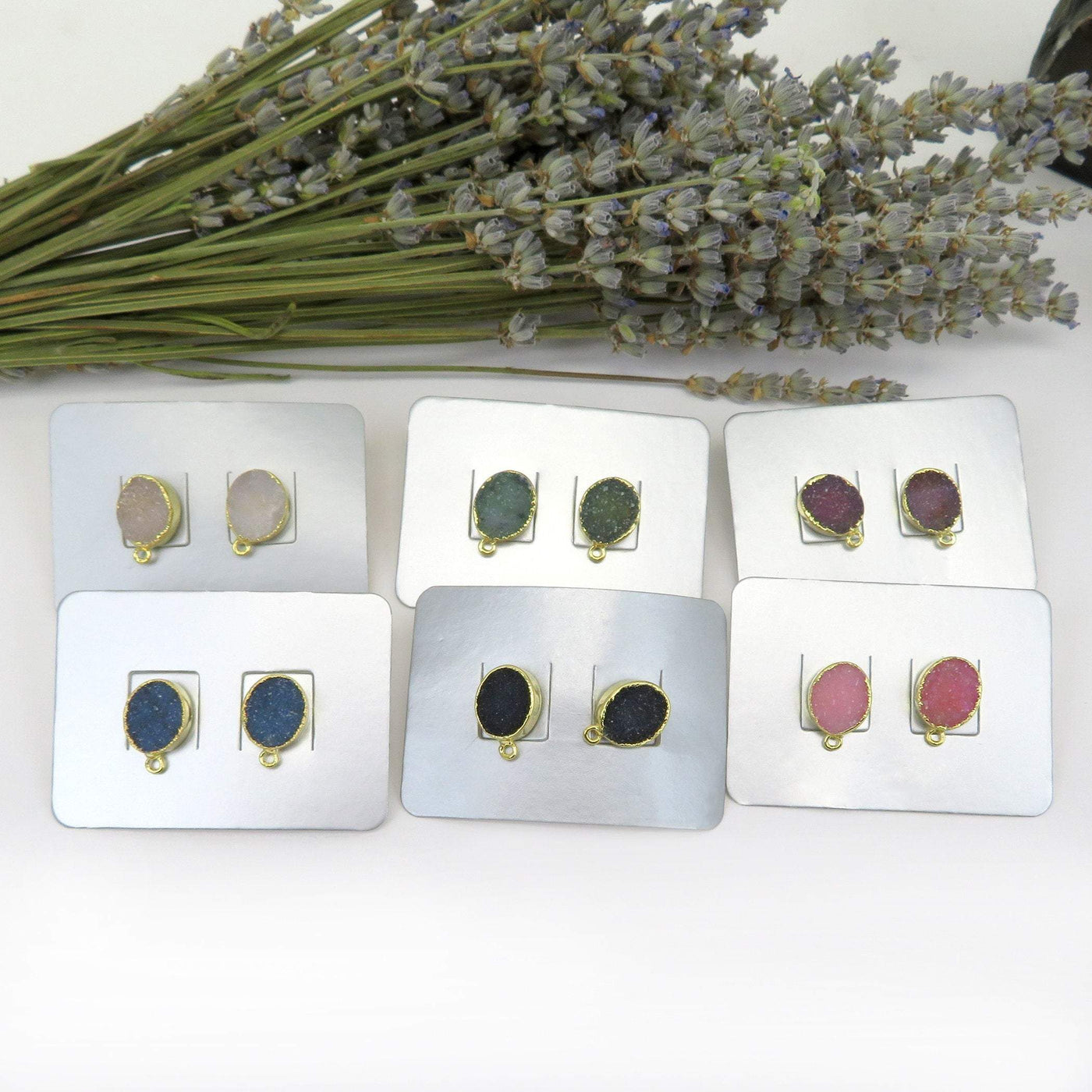 gold oval earrings come in white green purple blue black pink