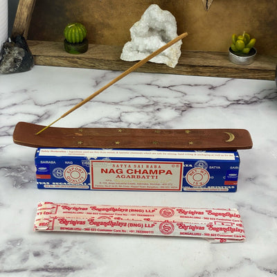 overhead view of satya hand rolled NAG CHAMPA incense on display