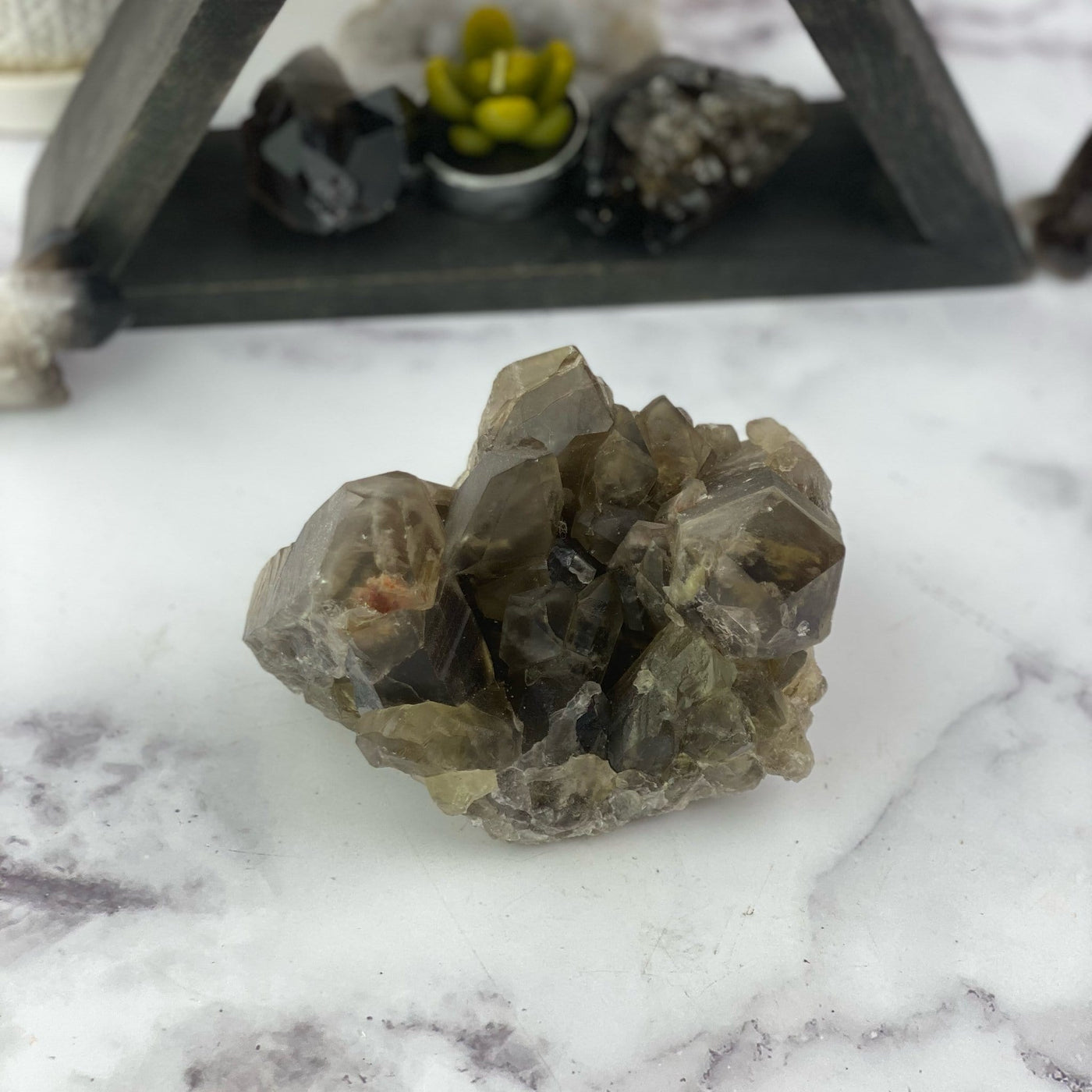 overhead view of natural smokey quartz cluster on display