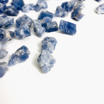 up close shot of blue calcite on white background