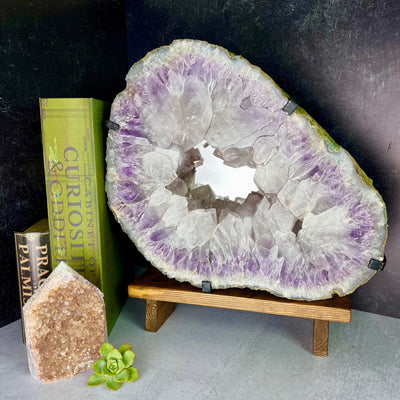 Frontal view of Amethyst Large Cluster Mirror, laying on side