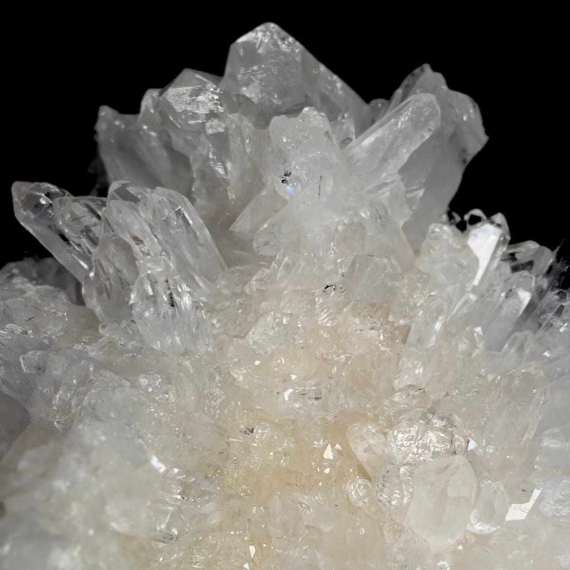 Up close view of quartz points and rainbows on the Rough Crystal Quartz Large Cluster.