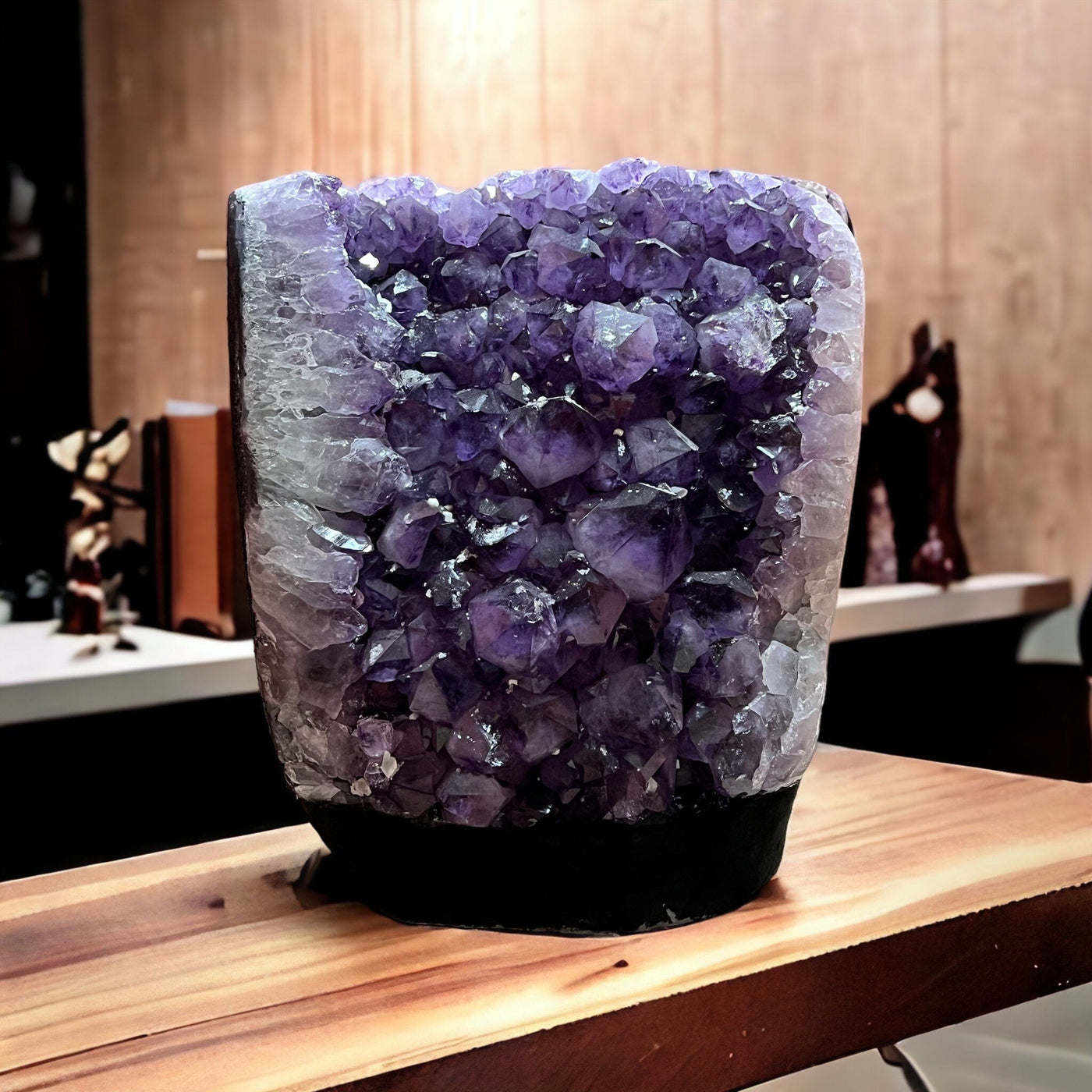 Amethyst Crystal Cluster Cut Base on a table for display