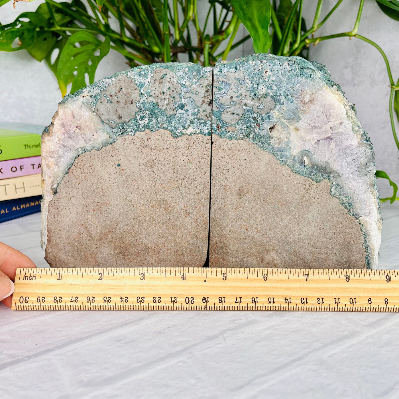 Back view of Amethyst with Calcite Cluster Bookend Set, next to a ruler for sizing reference