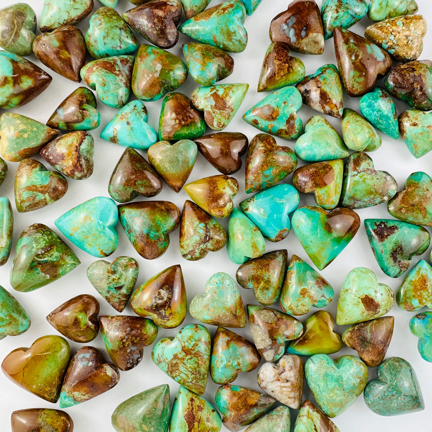 Turquoise Hearts  of assorted coloring and shapes and sizes of stock available