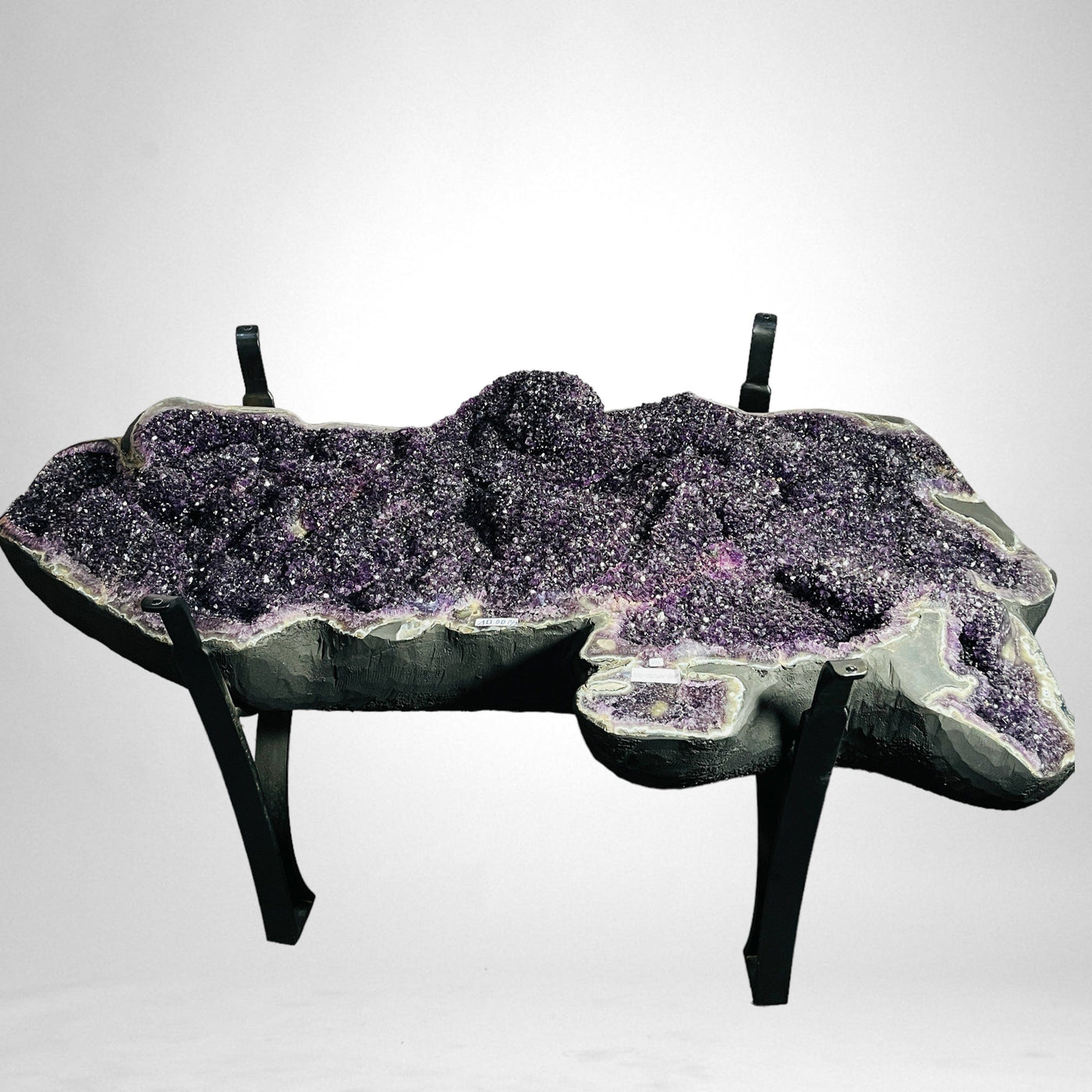 Amethyst Crystal Geode Table on Metal Base on white background