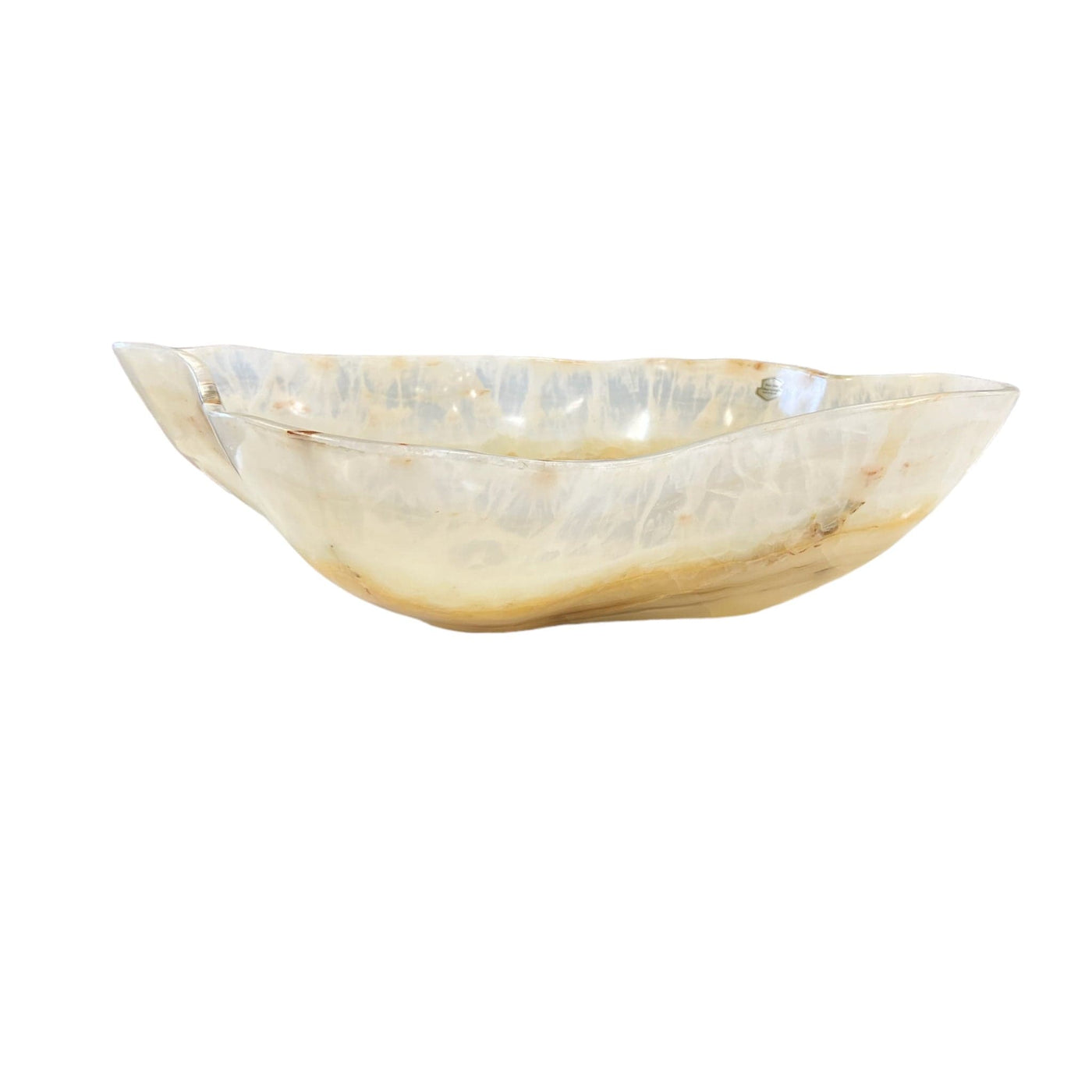 Large mexican onyx bowl displayed on a white background. It is shades of cream, tan, and brown.