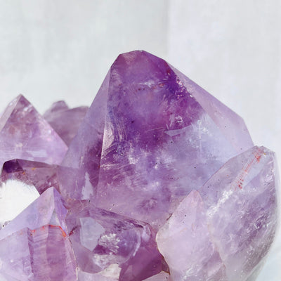 Up close view of the largest crystal point found on the Large Amethyst Point Cluster.