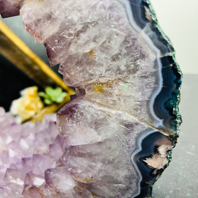 Close up of crystal formation and details on Amethyst Point Mirror
