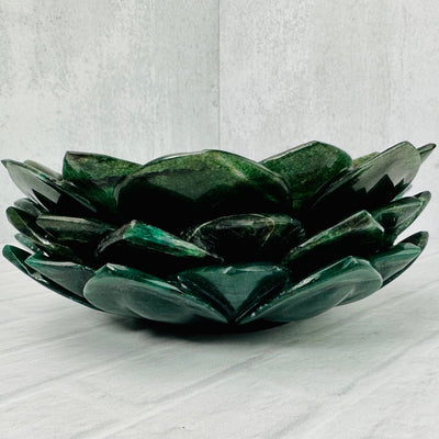 3 Green Quartz Lotus Bowls stacked on a white surface.