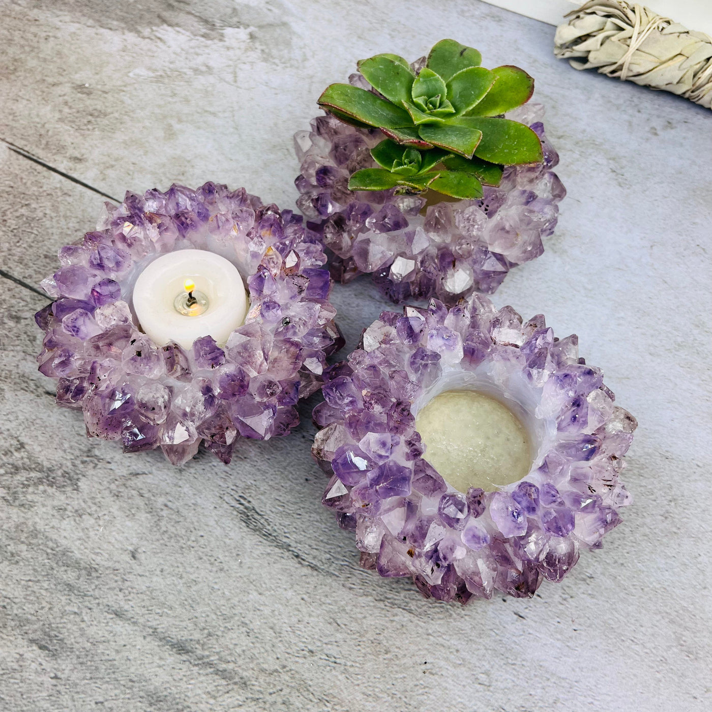3 Amethyst Point Candle Holders, one with a candle  and one with a plant