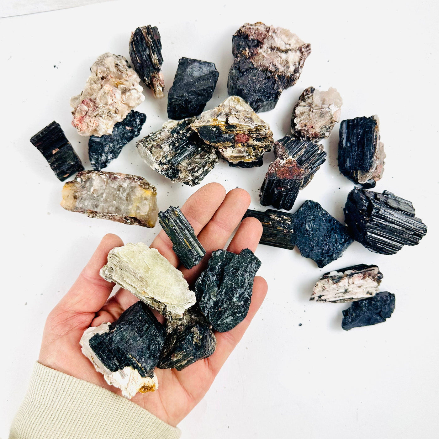 Black Tourmaline, on Matrix and Mica - Rough Assorted Size - 1 KILO worth with some in a hand for size reference