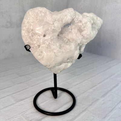 Frontal view of Crystal Quartz Cluster Heart on Metal Stand