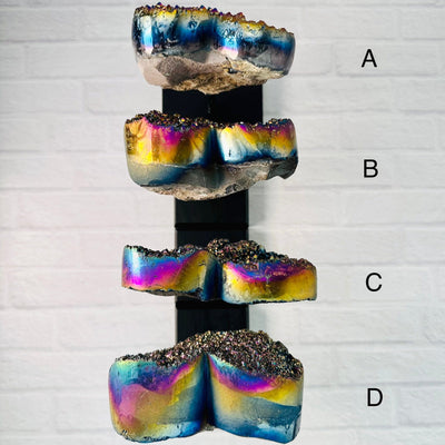 Aerial view of Titanium Hearts A, B, C, D, lined up in order from top to bottom, with respective letter next to them to identify.