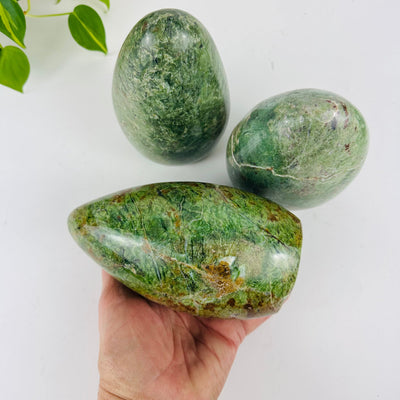 Green Opal Polished Cut Base - Lot of 3 with one in a hand for size reference