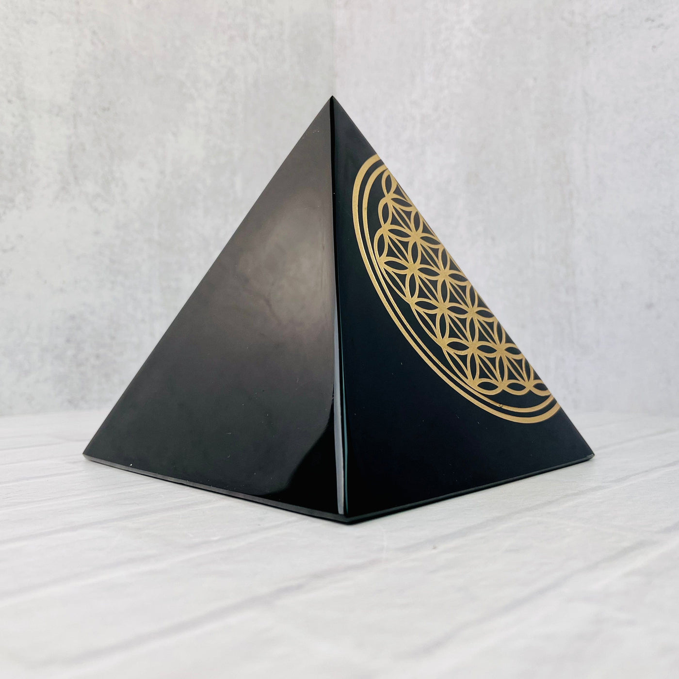 View of right side of Gold Sheen Obsidian Flower of Life Pyramid.