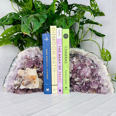 Frontal view of Amethyst Bookend Set with Calcite Cluster with 4 books in between