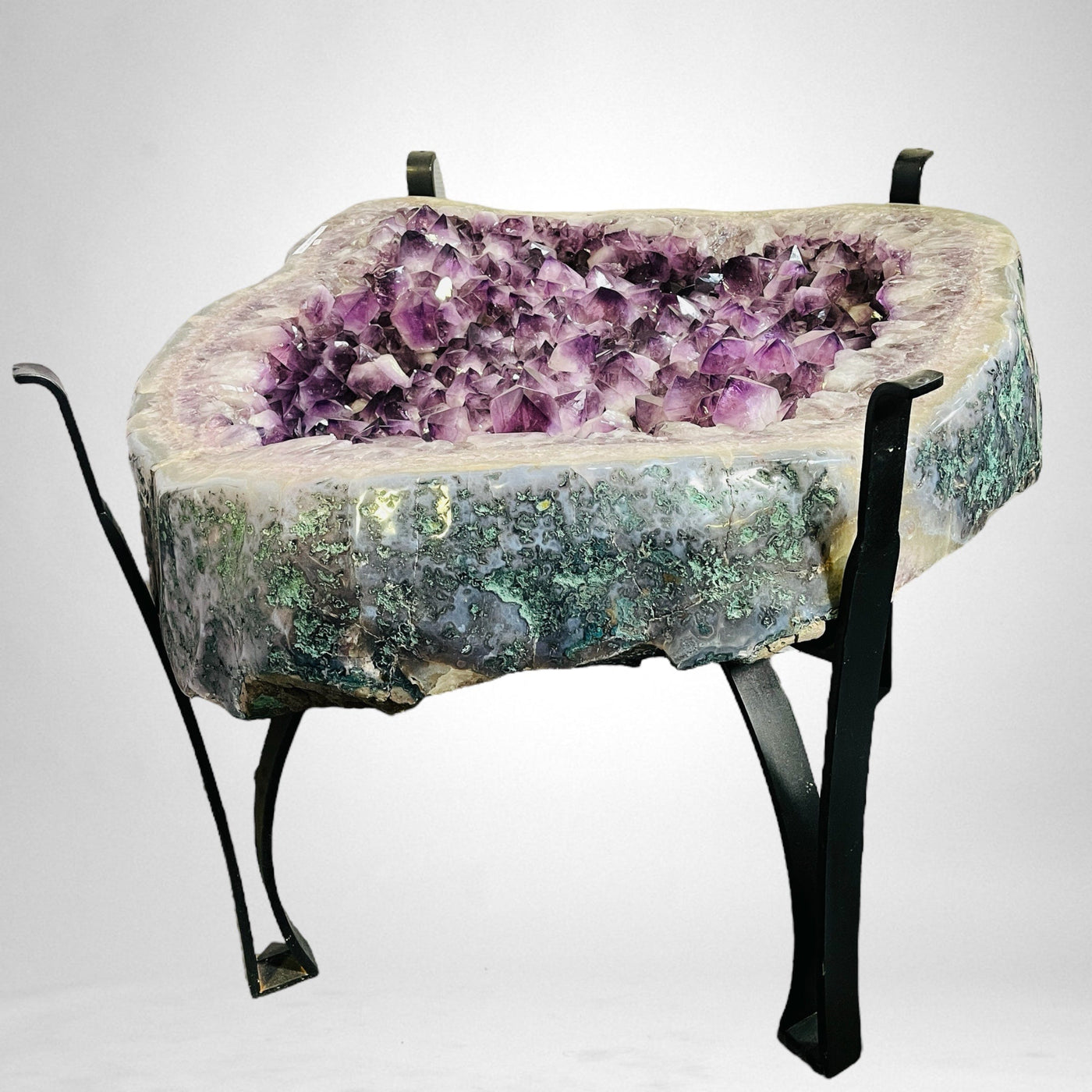 Amethyst Crystal Cluster Geode Table on Metal Base on white background