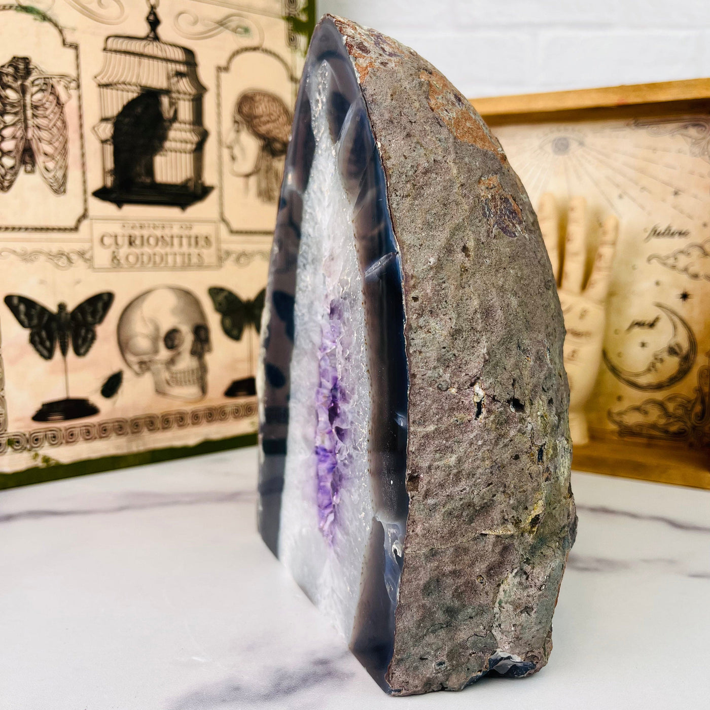 Angled side and front view of Agate Cut Base with Amethyst 