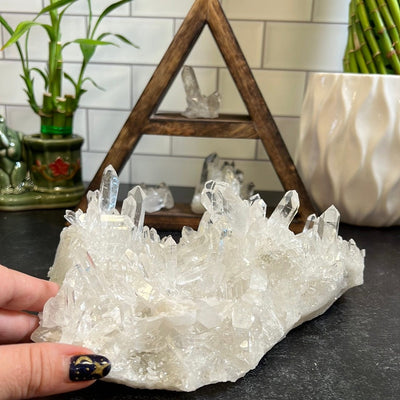 Large Crystal Quartz Cluster with clear points radiating in all directions all over the piece.