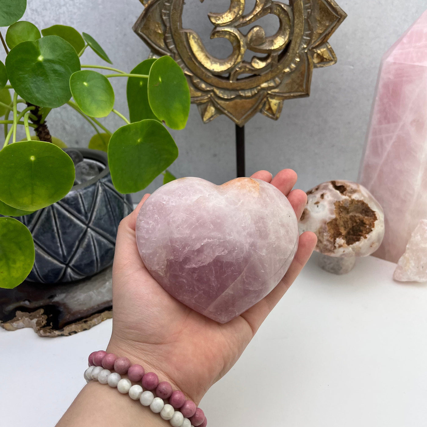 Polished Rose Quartz Heart - with hand for size reference 