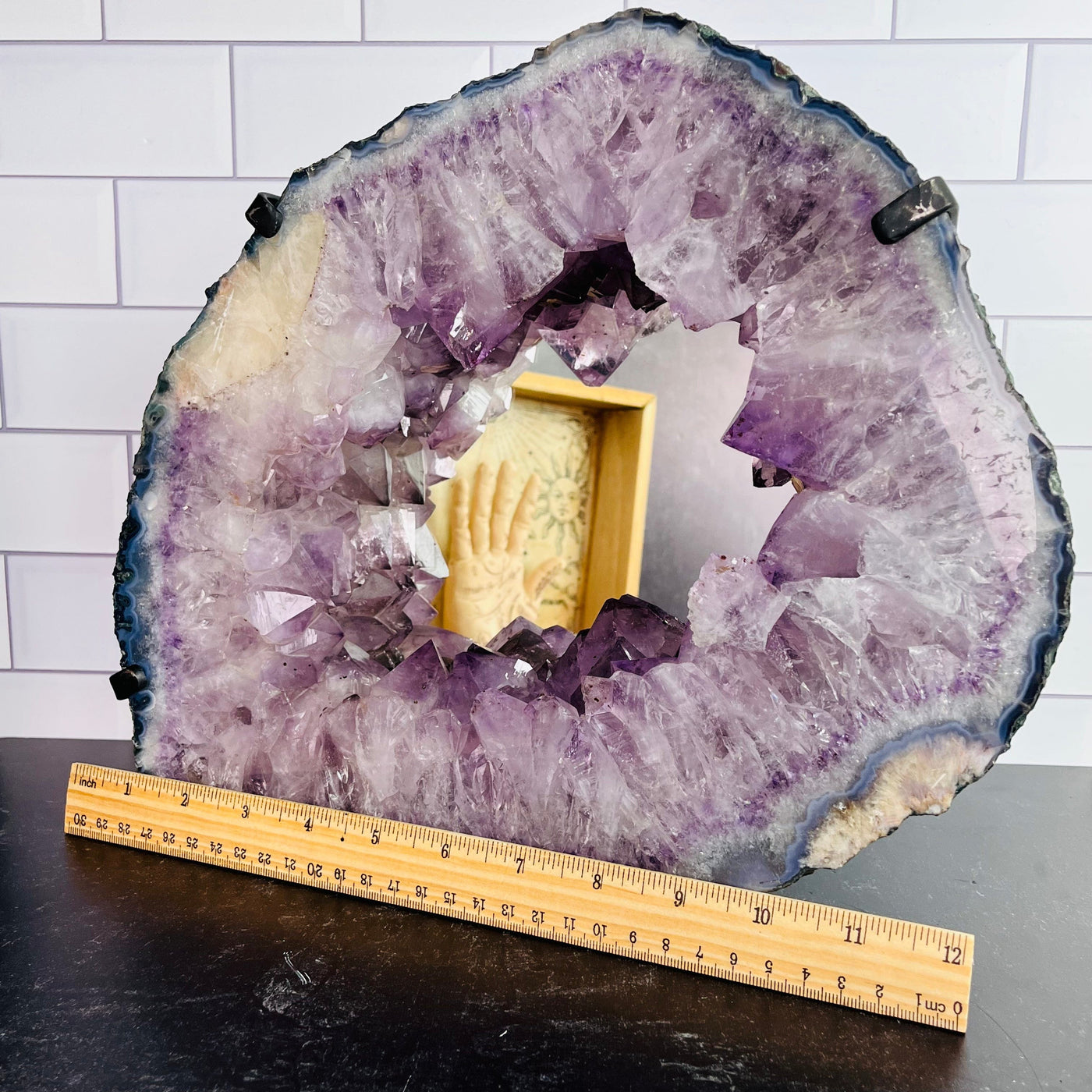 Frontal view of Amethyst Cluster with Calcite Mirror, pictured next to ruler