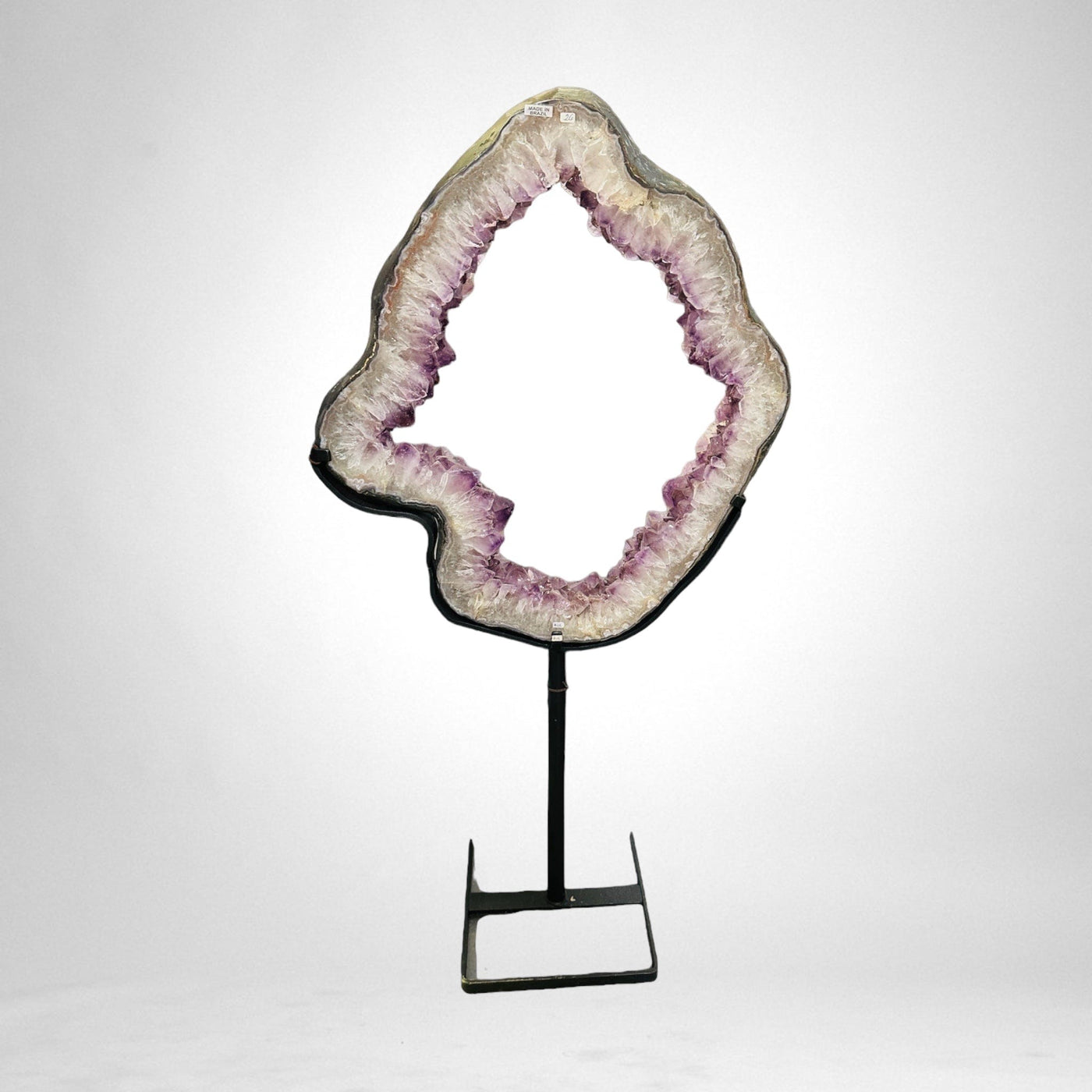 Large Amethyst Portal on Metal Stand on white background