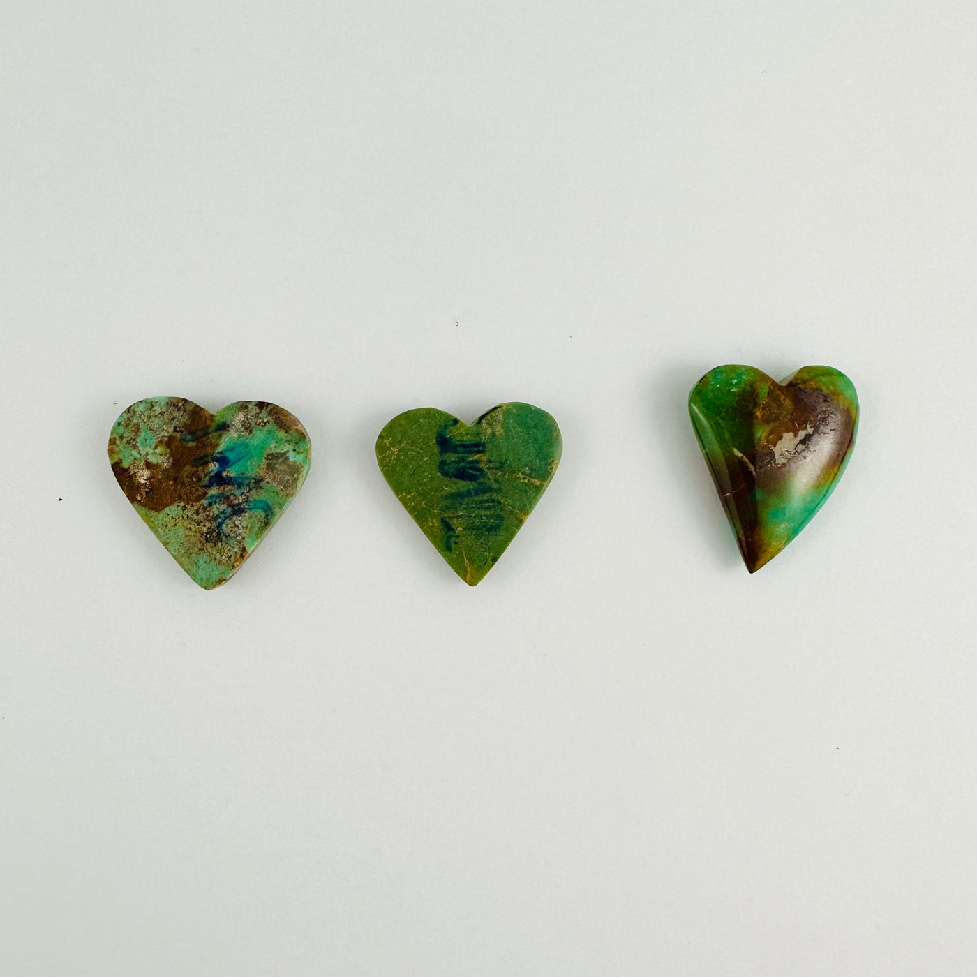Backside of 3 Turquoise Heart Cabochons