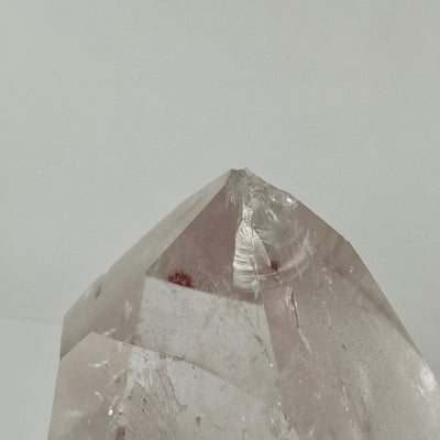 Crystal Quartz Polished Tower close up of a chip in the point
