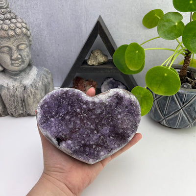 Amethyst Crystal Purple Druzy Heart Top view with hand for size reference 