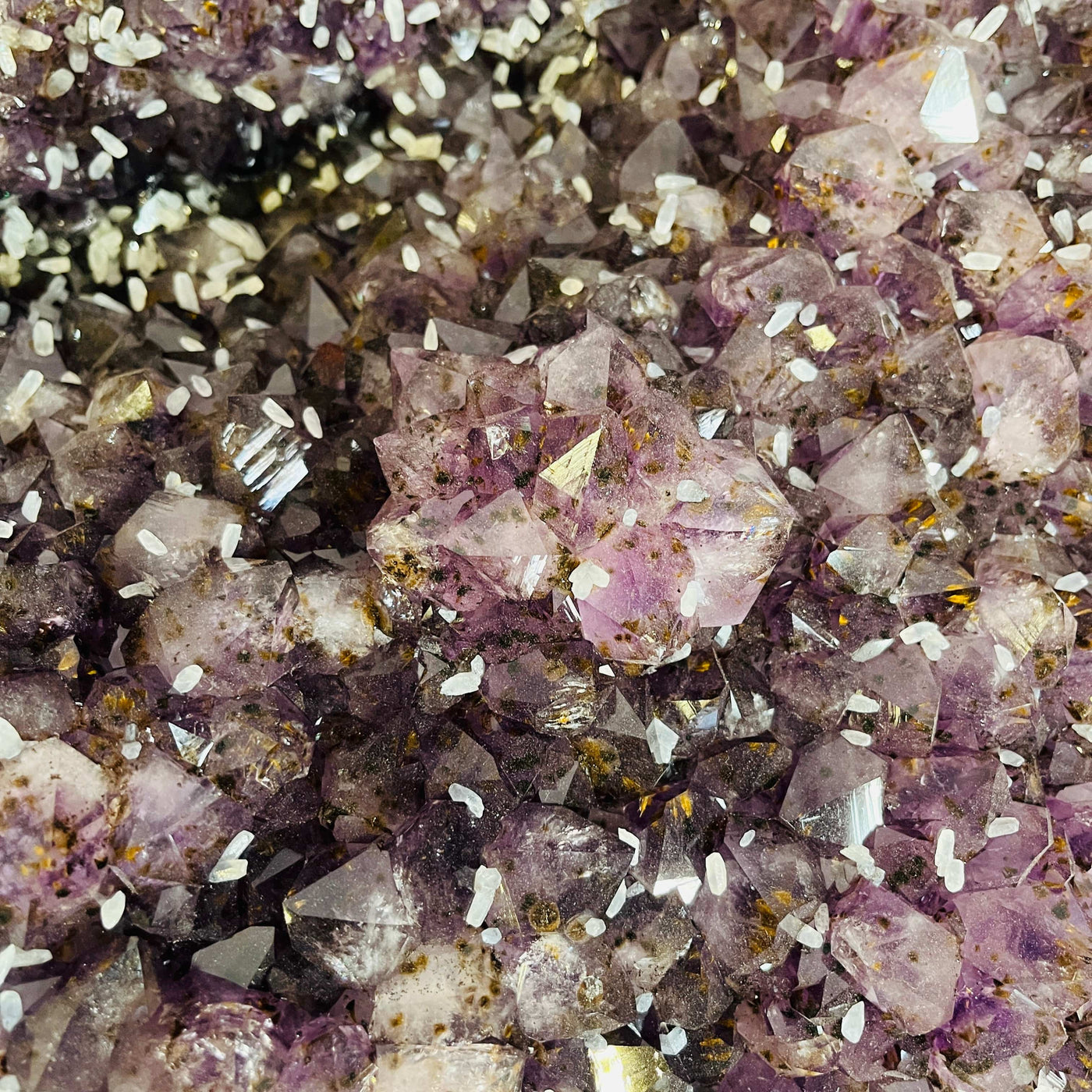 up close shot of Amethyst Crystal Cluster Geode Table on Metal Base