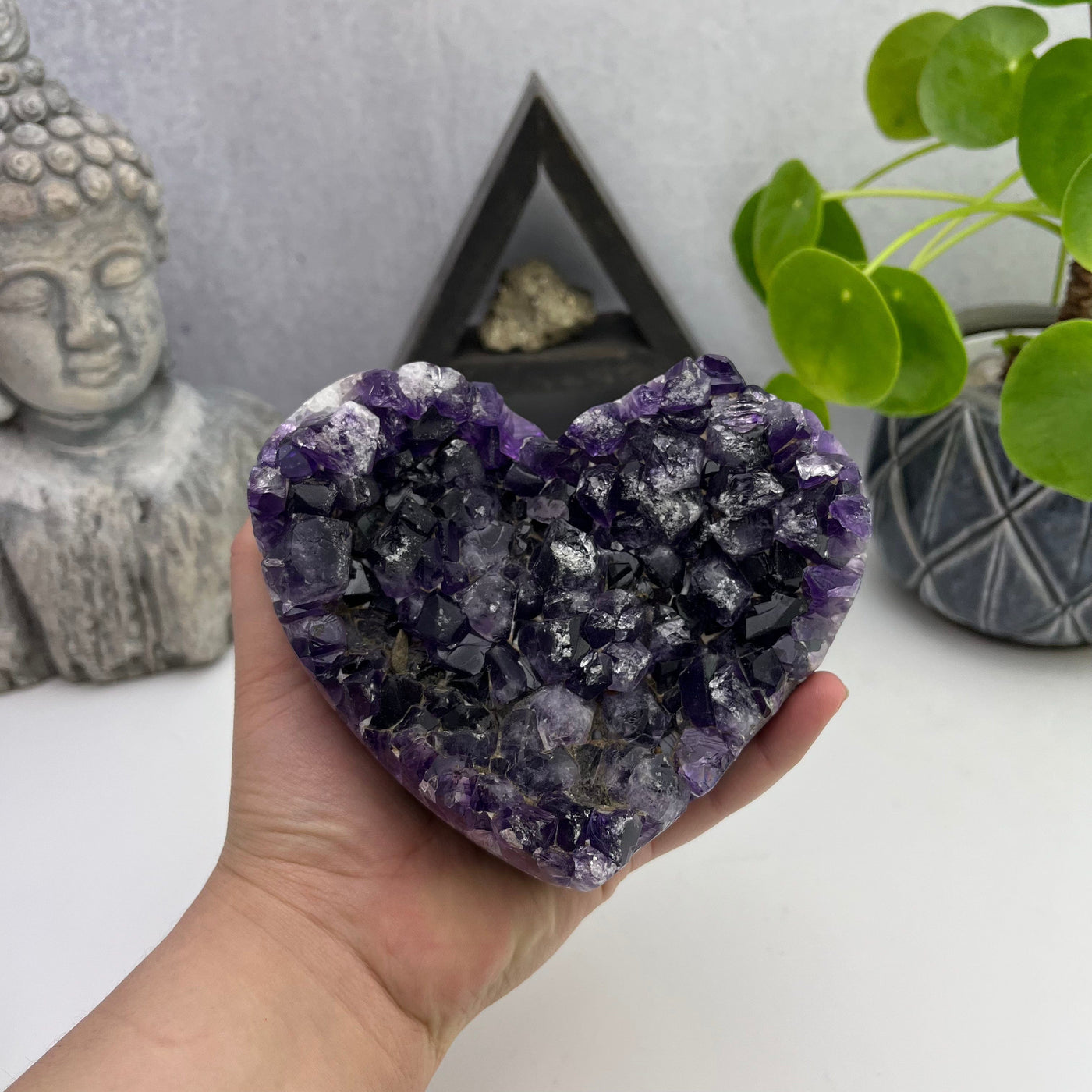 Purple Amethyst Heart Druzy Crystal with hand for size reference 