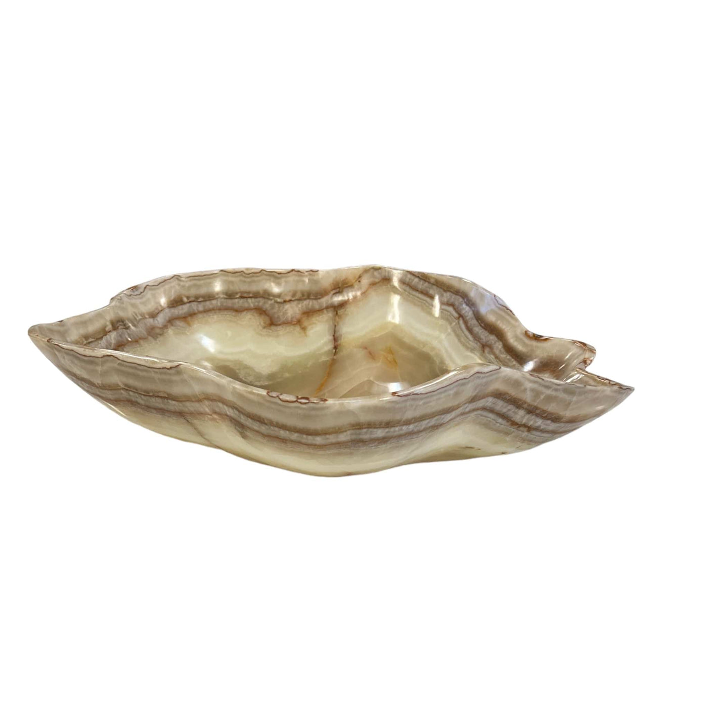 Large mexican onyx bowl displayed on a white background. It is shades of cream, tan, and brown.