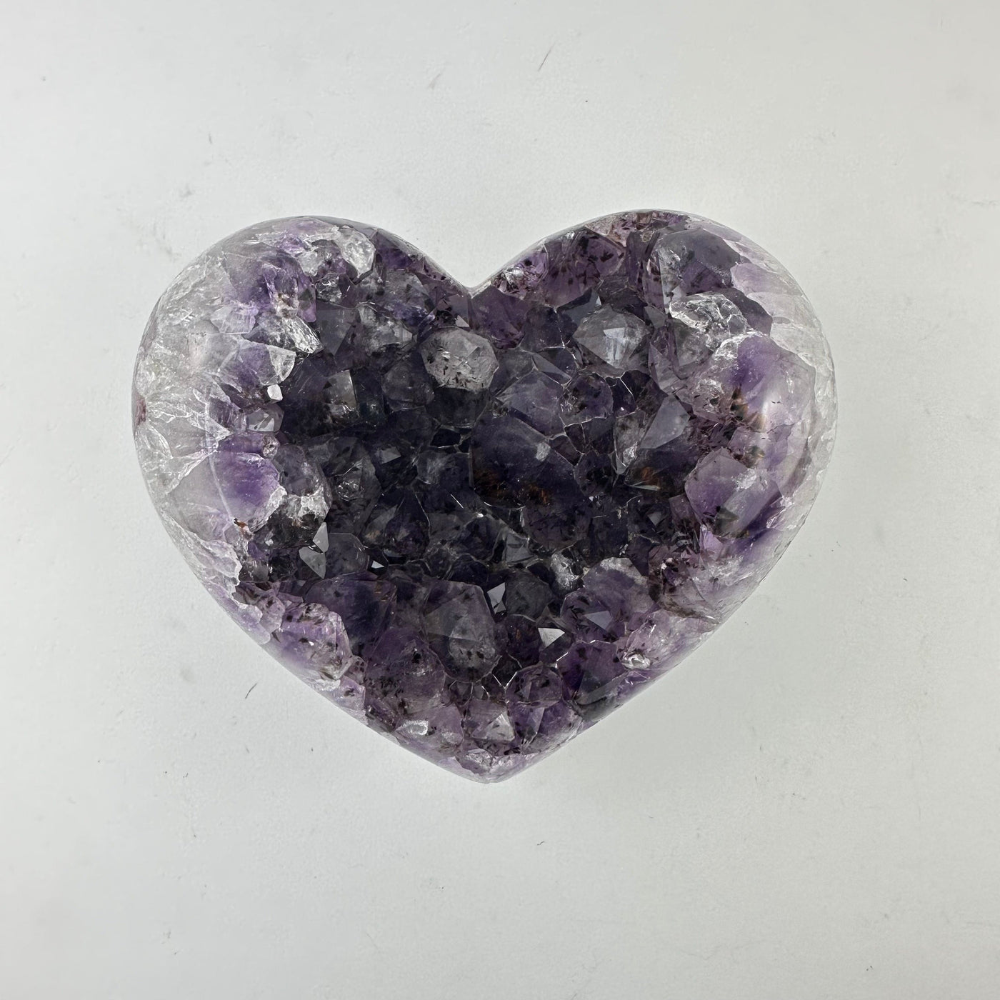 Amethyst Crystal Cluster Heart on table