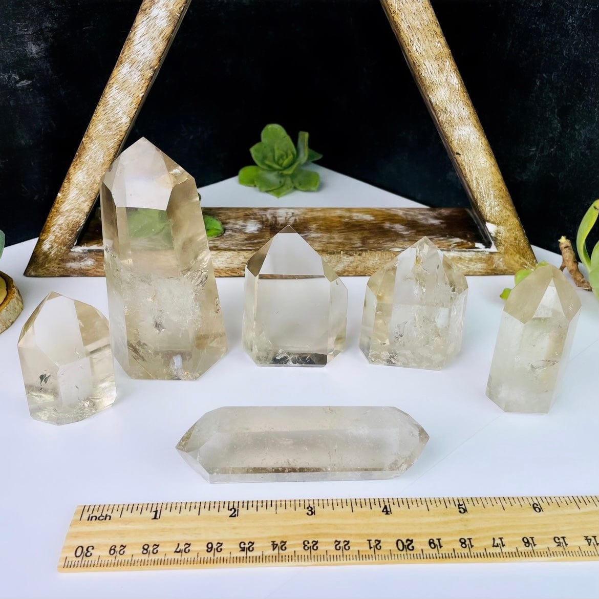Smoky Quartz Points with Inclusions - You Choose. All displayed next to a ruler for size reference.