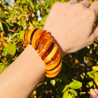 Frontal view of Baltic Amber Bracelet, worn on woman's wrist.
